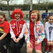 Pupils dressed up in red outfits and crazy clothes for Red Nose Day