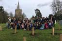 Great Bardfield Primary School students and teachers with the new trees at St Mary the Virgin Church