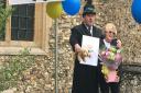 Pam Allen finished her Guide Dogs fundraiser through 2K walks through Great Dunmow at St Mary's Church, where she was presented with flowers