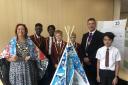 Felsted pupils with Mayor of Chelmsford Linda Mascot and Ian Mascot, and their insulating tent made of recycled crisp packets