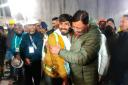 Rescued workers were greeted with shouts of joy from the site of the tunnel (Uttarakhand State Department of Information and Public Relations via AP)