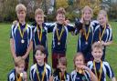 Great Dunmow Primary School's Year 6 tag rugby team show off their medals.