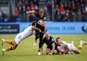 Max Malins makes a break during Saracens' win over Wasps in the Premiership.