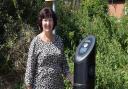 Councillor Wendy Schmitt of Braintree District Council with one of the new electric vehicle chargers at Newlands Drive car park, Witham