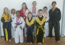 Students of Dunmow Taekwon-Do Club with their medals from the TAGB Midlands competition.