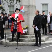 Town Crier Jody Huizar reads the Proclamation of the Ascension of King Charles III in Great Dunmow