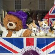 The Rose Garden florist, Great Dunmow: The Platinum Jubilee window featuring Big Ted and the corgis