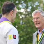 Neville Wilson receives the Silver Wolf, the Scouting movement's highest honour, from District Commissioner Nigel Bailey in Great Chesterford