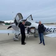 Dunmow businessmen Jeremy Taylor and Clifford Smith with the Ukraine medical aid in the Ciruss SR22