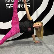 Pilates and yoga instructor Jade Gooding at Birmingham's NEC to support the Essex company Designed By Sports