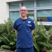 Benedict Punchard, senior charge nurse, in the new Broomfield Hospital garden for critical care patients