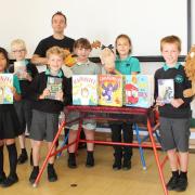 Author Gareth Jones and children at Dunmow St Mary's Primary School