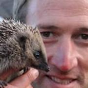 Ben Fogle with a hedgehog