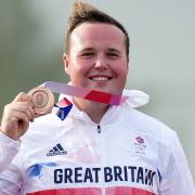 Great Britain's Matthew Coward-Holley poses with his bronze medal after finishing third in the Trap Men's final at Asaka Shooting Range