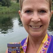 Gillian Robertson of Grange Farm & Dunmow Runners with another one of her medals.