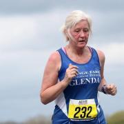 Glenda Jackson of Grange Farm & Dunmow Runners at the Hatfield 5 on Bovingdon Airfield.