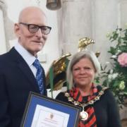 William Chastell receiving his award from the Dunmow Mayor, Councillor Emma Marcus, in 2019