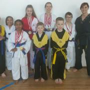 Students of Dunmow Taekwon-Do Club with their medals from the TAGB Midlands competition.
