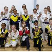 The Dunmow TKD squad show off their medals and trophies from the English Championships. Picture: DUNMOW TKD
