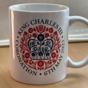 The front of the coronation mug donated by Mulberry Homes
