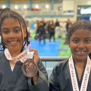 Sisters Ariella and Alyse Dixon-Bellot competed for Dunmow TKD at the Welsh championships. Picture: DUNMOW TKD