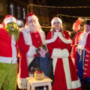 George Muscrost, nine, switching on the Dunmow Christmas lights