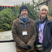 St Clare Hospice's head of income generation Rosie Knowles and her dad Steve, helping to collect Christmas trees in January this year