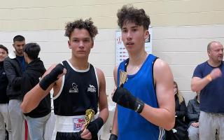 Rayne Boxing Club’s Donney Buckley (left) with opponent Leyton Nanton at the Meadowcroft Community Centre.