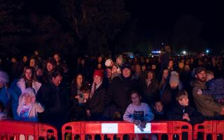 The crowd enjoying the 2021 Great Dunmow Round Table's firework display and bonfire at the Recreation Ground