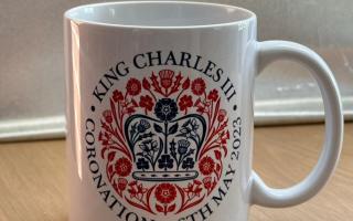 The front of the coronation mug donated by Mulberry Homes